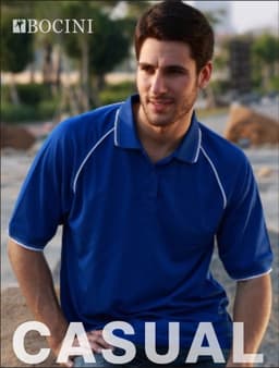 A blue unisex polo shirt with contrasting trim, featuring a logo, shown on a model in an outdoor setting.