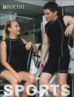 A performance tank top in black with contrasting trim, displayed on a man and woman in a gym setting.