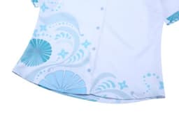 A white shirt with blue patterns and a logo on the side. Features a button closure and short sleeves.