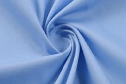 A light blue fabric in a spiral pattern, showcasing a smooth texture suitable for clothing.