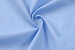 A light blue fabric with a smooth texture, showcasing a twirling design. It has a soft, comfortable appearance.