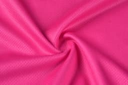 A textured fabric in vibrant pink, featuring a smooth, stretchy weave. It has a light and breathable appearance.