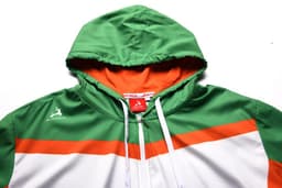 A junior hoodie in green, white, and orange, featuring a hood and a logo. Water-repellent material.
