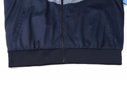 A navy-blue polar fleece hoodie featuring a zippered front and side pockets. Includes logo branding.