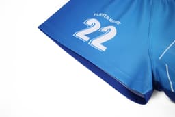 AFL uniform man shorts in blue, featuring a player number on the side and a logo.