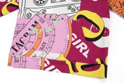 A brightly coloured cotton hoodie featuring bold graphic patterns and a pocket. The design includes pink, yellow, and purple elements.