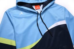 A blue and navy hoodie with a green stripe, featuring a logo and drawstring hood.