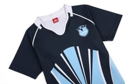 A rugby tee in navy and light blue with a logo and a modern design, featuring short sleeves and a v-neckline.