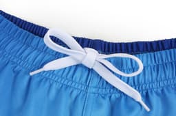 A pair of blue shorts with a matching light blue drawstring at the waist and an elastic waistband.