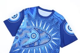 A blue Aboriginal cotton t-shirt featuring intricate geometric patterns and a logo.