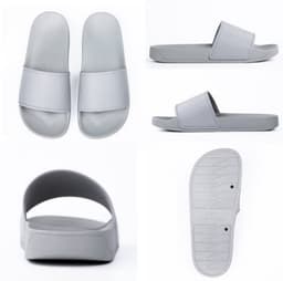 A pair of grey slippers with a wide strap, viewed from different angles, featuring a simple design and textured sole.
