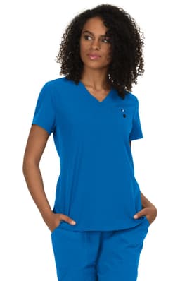 A blue top with a v-neckline and a small pocket, modelled by a woman with curly hair. It has a logo.