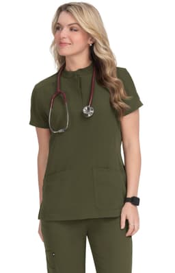 A woman wearing a short-sleeved, olive green medical scrub top, with a stethoscope around her neck.