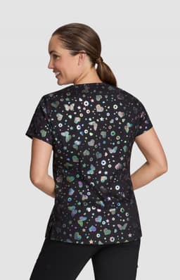 A black top featuring a colourful print of flowers and stars, with a round neckline and short sleeves.