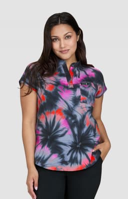 Ari Top (Print) featuring a vibrant tie-dye pattern in shades of pink, purple, and black on a stylish short-sleeve design.