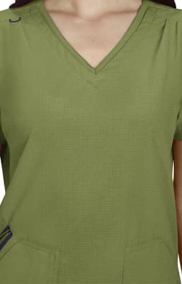 A green Sari Top with a V-neck and short sleeves, featuring subtle pleats and pockets. It has a small logo.