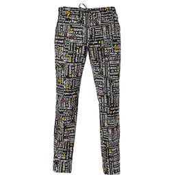 Patterned black and white trousers featuring various text and symbols, with hints of yellow. Includes a waistband with a logo.