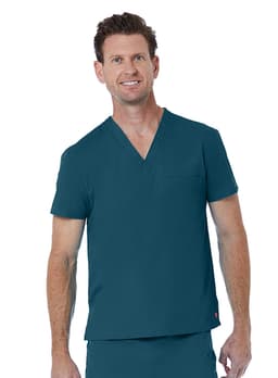A unisex V-neck top in teal, featuring short sleeves and a chest pocket, modelled by a man.