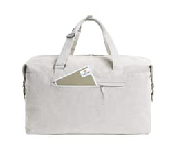 A beige duffle bag with handles, featuring a front zip pocket and a card peeking out. The bag has a logo.