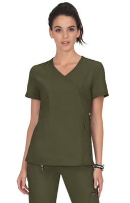 A scrub top in olive green with a crossover neckline and short sleeves, featuring a pocket and branding.