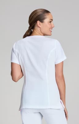 A white women's top, featuring a fitted design, viewed from the back, with a logo on the side.