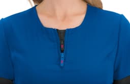 A blue top featuring a half-zip design, with a smooth texture and a round neckline. It has a logo on the zipper.