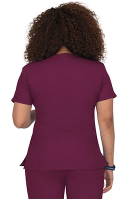 A top in a deep burgundy shade, featuring short sleeves and a relaxed fit. The garment has a subtle peplum detail.