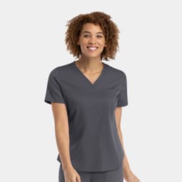 A women's v-neck top in a dark grey colour, featuring a tuckable design and short sleeves. It has a logo.