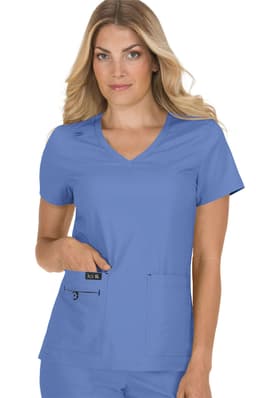 A blue medical scrub top with a V-neck and front pockets, featuring a logo on the side.