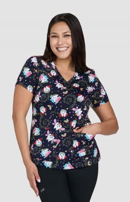 A printed top featuring a navy background with colourful festive designs, short sleeves, and a relaxed fit.
