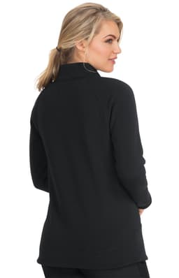 A woman wearing a black wellness jacket, viewed from the back, featuring a high collar and long sleeves.