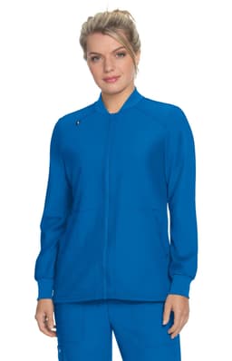 A blue jacket with long sleeves, a zip front, and a logo on the chest, worn by a model.