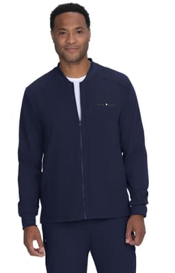 A navy jacket with a zip closure, featuring a logo on the front. The model is wearing it with a white top underneath.