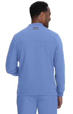 A man wearing a light blue jacket, viewed from the back, featuring a subtle logo on the neck.