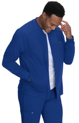 A blue jacket with a zip front, featuring a chest pocket, worn by a smiling man. The jacket has a relaxed fit.