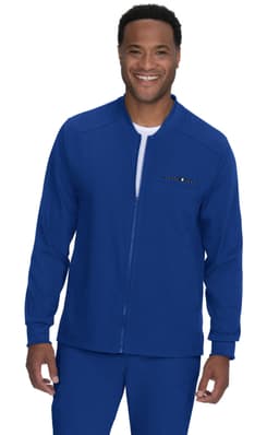 A blue jacket with a zippered front and a logo, worn by a smiling individual.