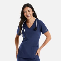 A navy women's double V-neck top with short sleeves, featuring a stethoscope and pockets, along with a branding logo.