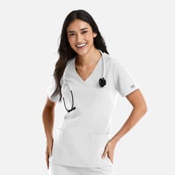 A woman in a white double V-neck top with short sleeves, wearing a stethoscope, and smiling.