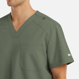 A men's v-neck top in olive green, featuring a pocket and a logo on the sleeve.