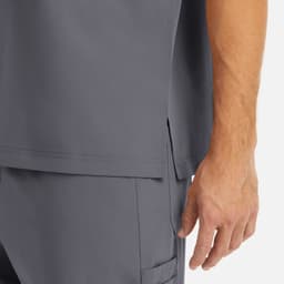 A grey men's tuckable V-neck top, featuring a side split and a close-up of the fabric texture.