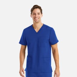 A man is wearing a vibrant blue v-neck top with three pockets. The top has a logo on it.