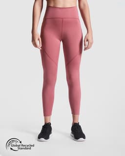 A pair of high-waisted leggings in a dusty rose colour, featuring a side pocket and a logo.