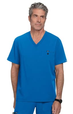 A blue medical scrub top with a v-neck design and a chest pocket. The model has grey hair and wears a watch.