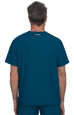 A T-shirt in a deep teal colour, featuring a simple design and a small branding logo on the back.