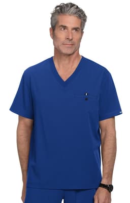 A scrubs top in vibrant blue, featuring a V-neck design and pocket, displayed on a model with grey hair.