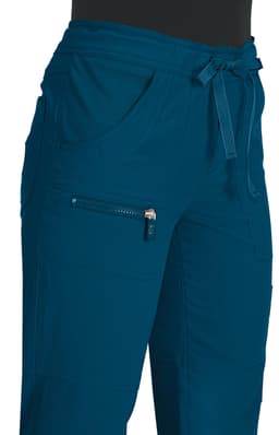 A pair of teal pants featuring a drawstring waist and multiple pockets, including a zippered one.