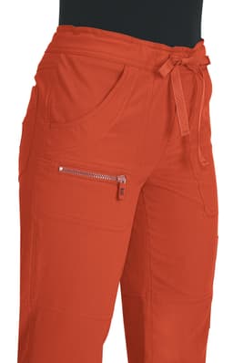 An orange pair of pants with a drawstring waist and zippered pocket details.