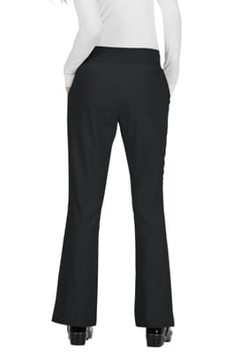 A pair of black pants featuring a flared design, viewed from the back, against a plain background.