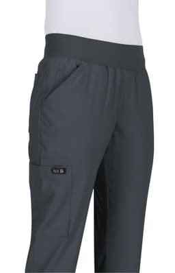 A pair of dark grey pants with a wide waistband and side pockets, featuring a logo on one leg.