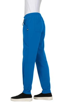 A pair of blue jogger pants with an elastic waistband and side pockets, modelled against a plain background.